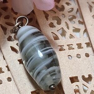 Glass charm for sale swirl design